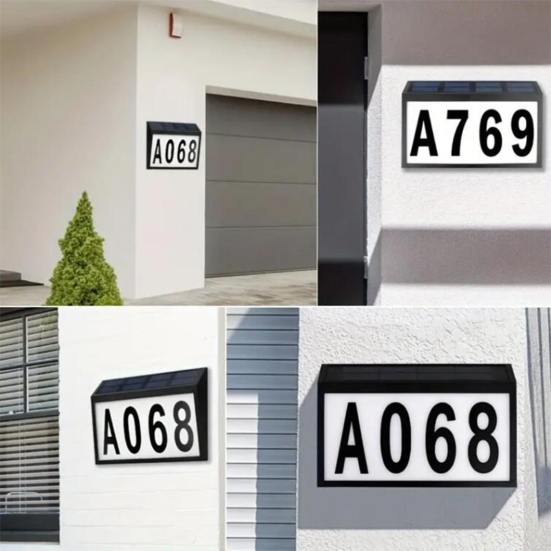 Luminös solcellsbaserad husskylt i akryl